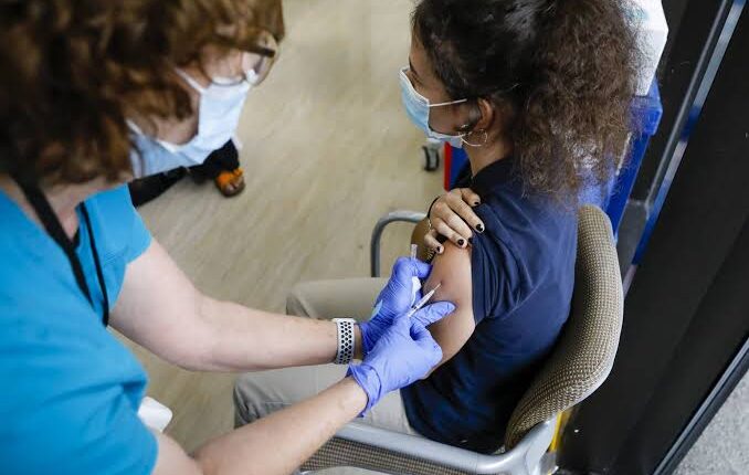 yogi-adityanath-inspects-booths-as-vaccines-for-kids-in-12-14-age-group-starts