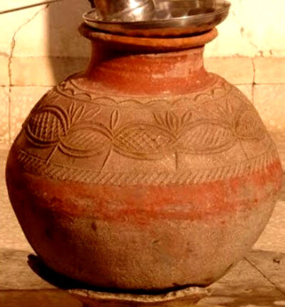 Passengers will get medicinal water of the temple well in the scorching sun